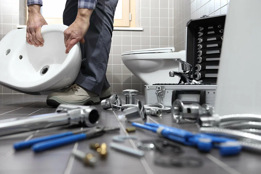 Plumbing tools prepared for a bathroom repair in Brentwood